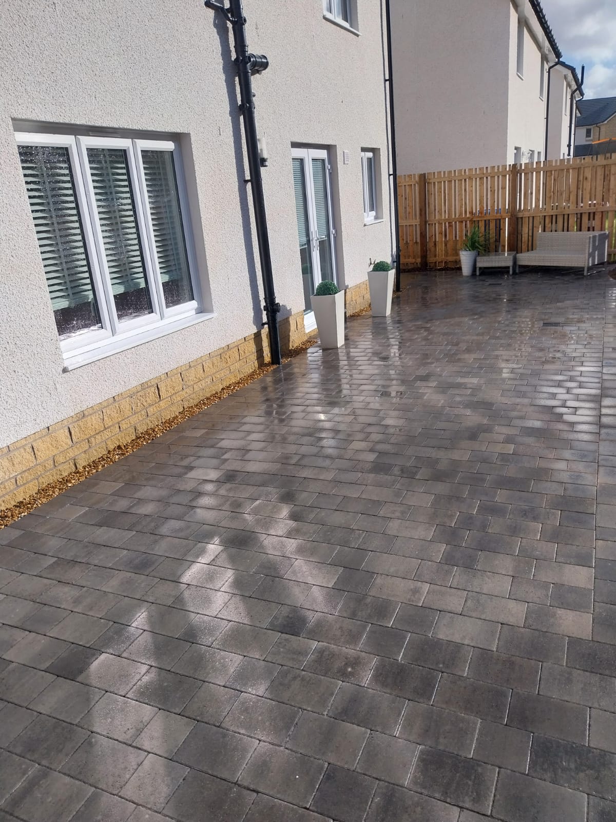 Raised patio with stone slabs Renfrew